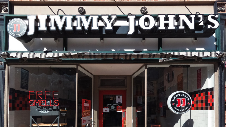 Jimmy Johns exterior with Free Smells neon sign