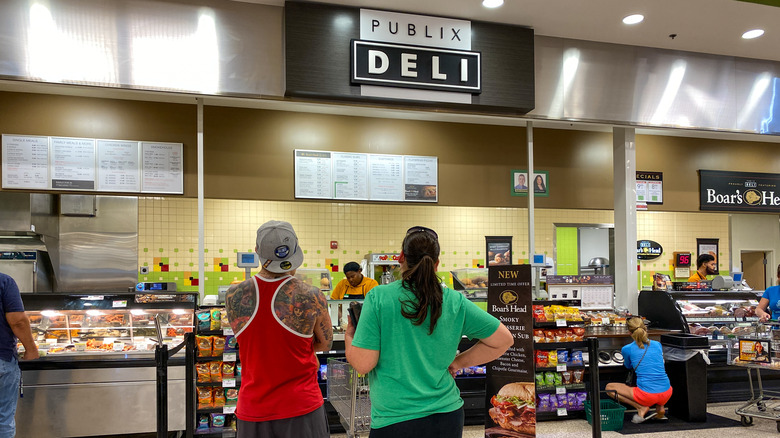 People waiting in line at the Publix deli