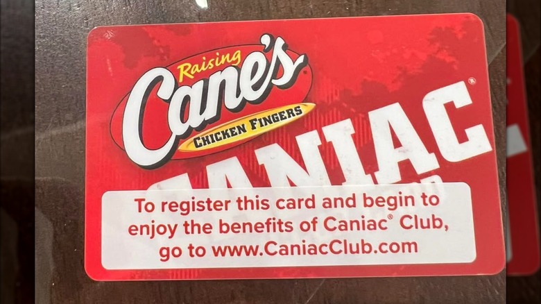 Caniac Club card on a table