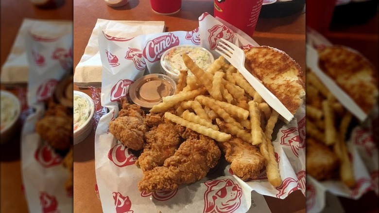 The Box Combo with tenders, bread, coleslaw, and fries