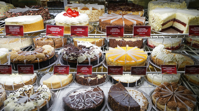 Assorted cheesecakes in a bakery display