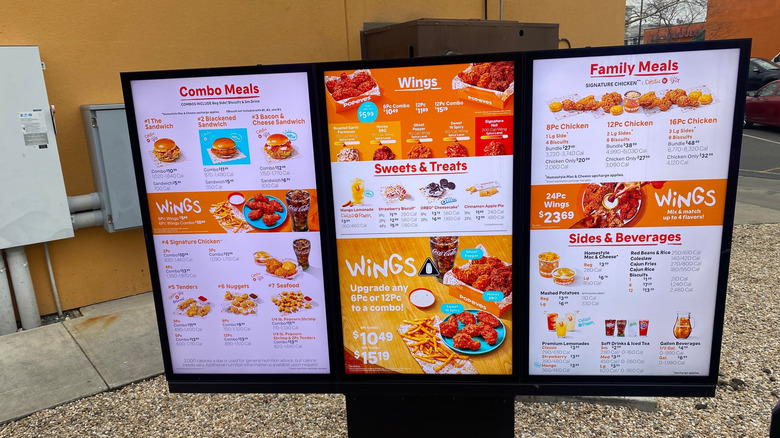 Menu board outside at Popeyes restaurant