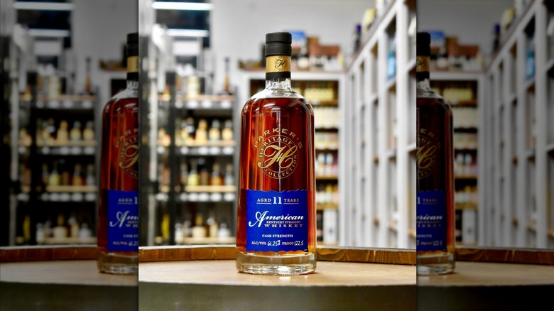 Parker Heritage bourbon bottle on table