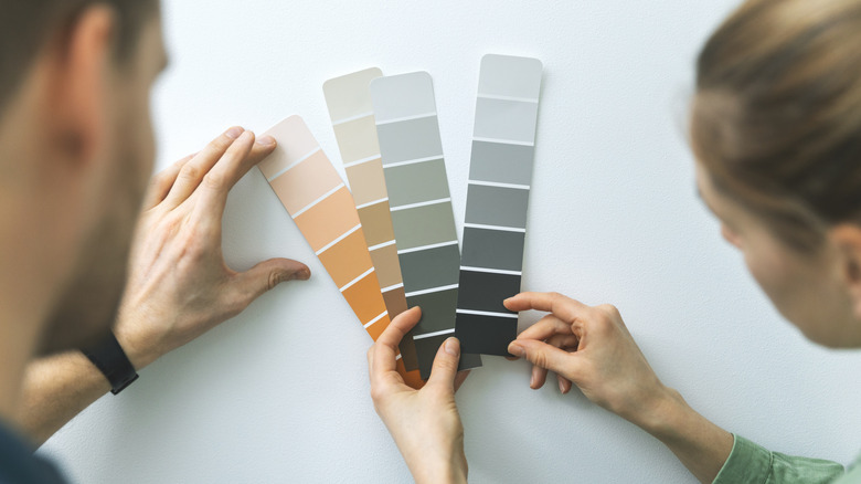 couple choosing paint colors.