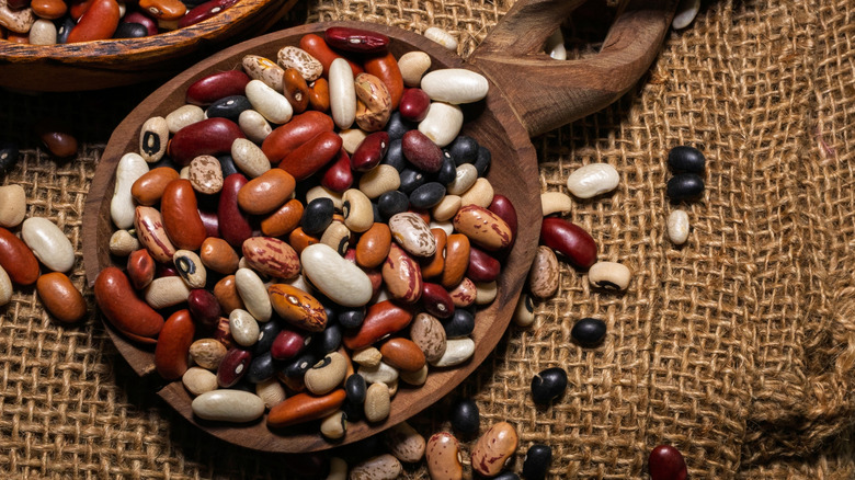 A bowl of dried beans of different types