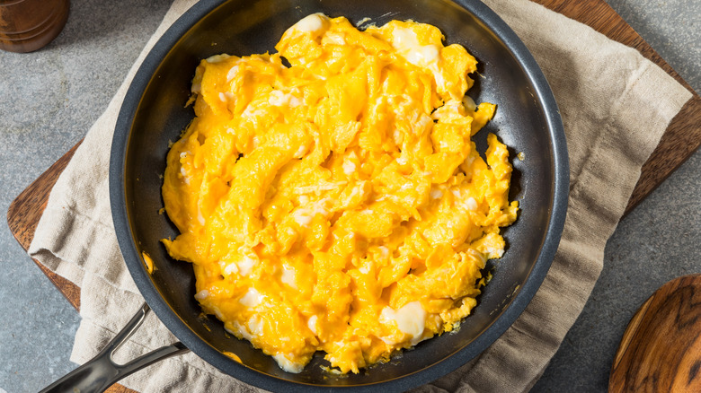 scrambled eggs in a cast iron skillet