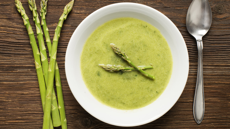 Asparagus soup with spoon 