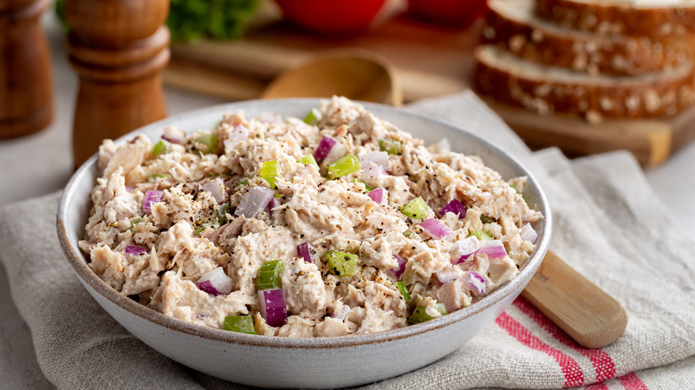 tuna salad in a bowl on a table cloth