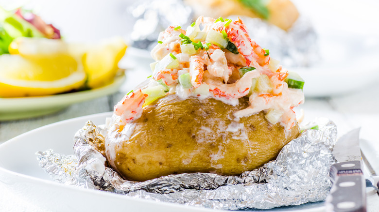 baked potato with seafood topping