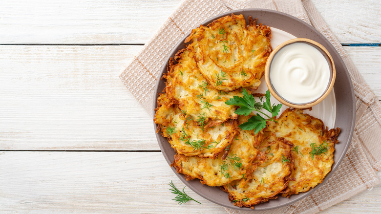latkes on a plate with garnish