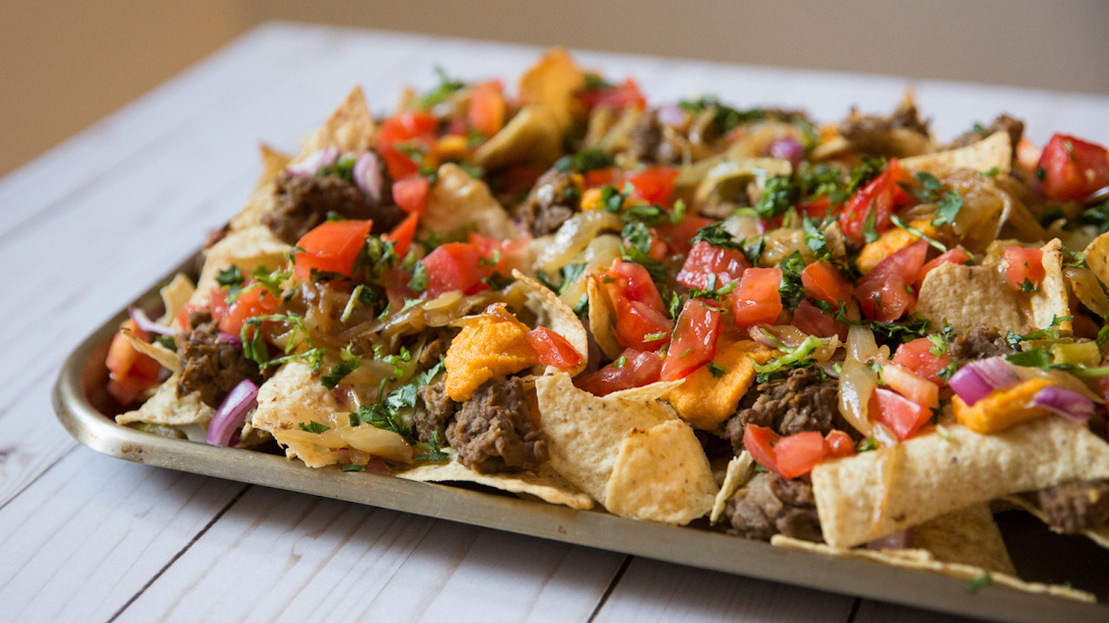 Use Blended Cashews In Place Of Cheese Sauce For Vegan Nachos