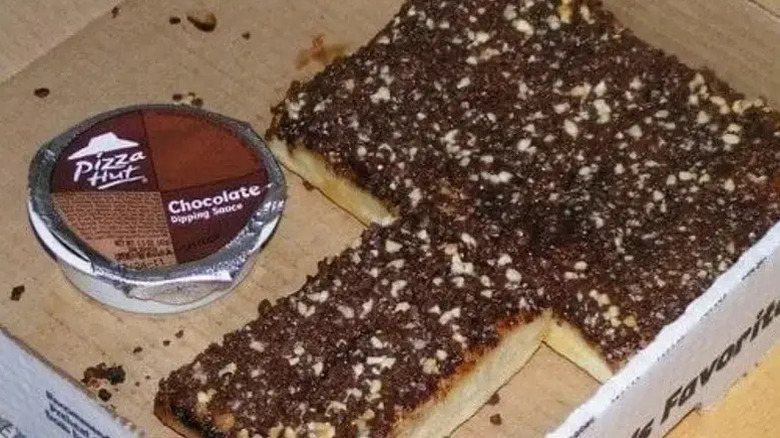 A box of Pizza Hut Hershey's Chocolate Dunkers with a container of chocolate dipping sauce