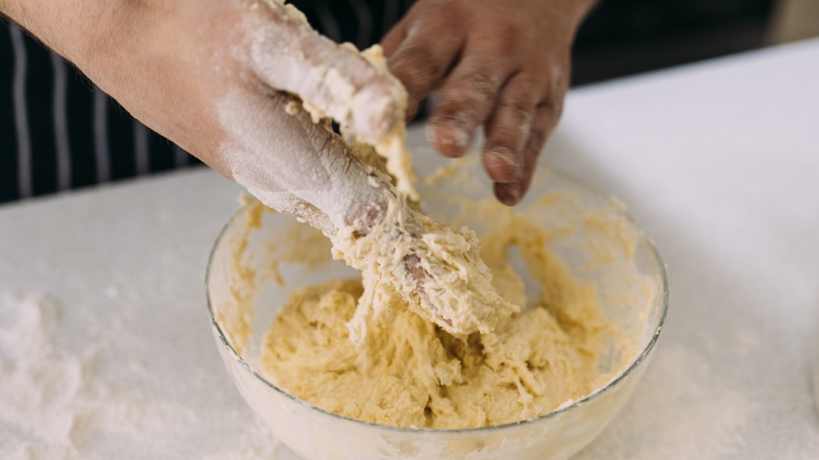 Use Dry Flour To Easily Clean Sticky Dough Off Your Hands