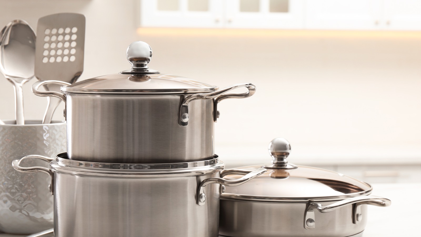 Use Hooks To Store Pot Lids On Doors And Free Up Space