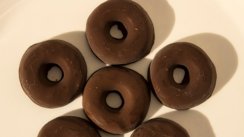 Close-up of chocolate-covered jelly rings