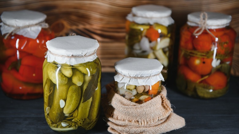 Glass jars with pickled vegetables