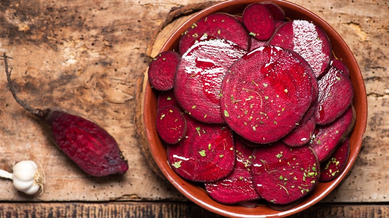 Top-down view of sliced beets on in plate