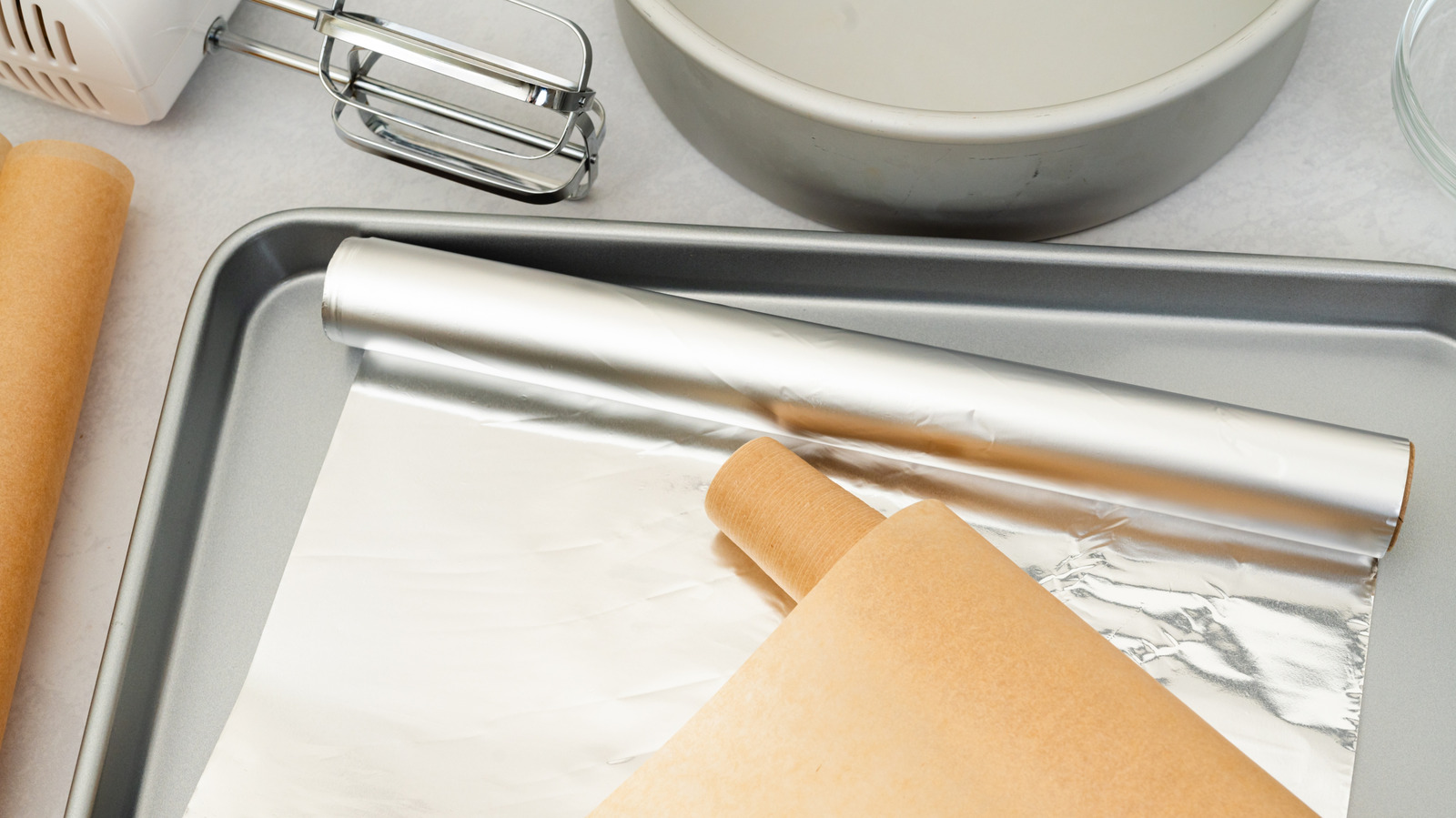 When To Use Aluminum Foil Vs Parchment Paper In The Oven - Tasting Table