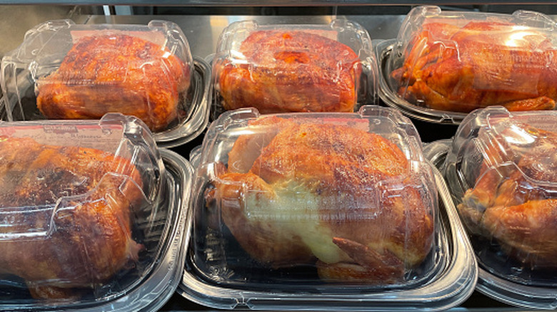 Rotisserie chickens in plastic containers
