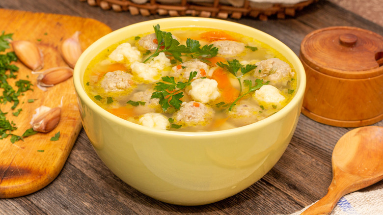 Bowl of chicken and dumplings with veggies