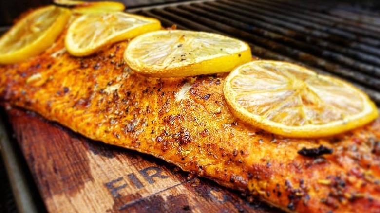 Wood plank grilled salmon