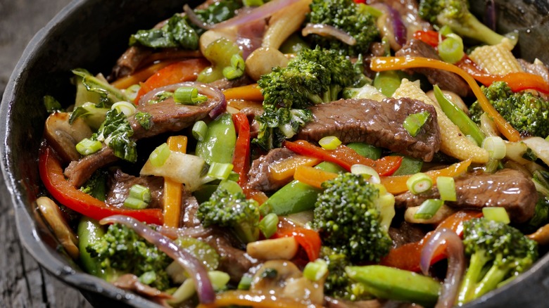 Close-up of beef and vegetable stir fry in a pan
