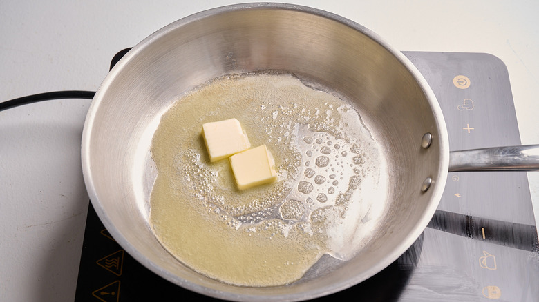 melting butter in a skillet