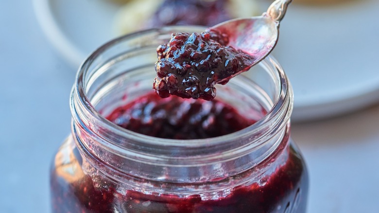 spoon holding jam out of jar