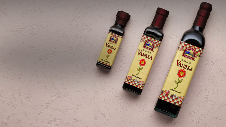 Three vanilla extract bottles