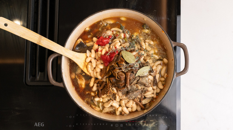 assembling cassoulet in pan