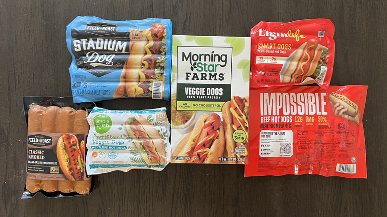 6 different store-bought plant-based hot dogs.