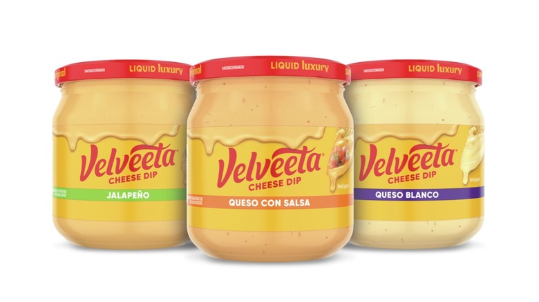 Three Velveeta cheese dip flavors on a white background