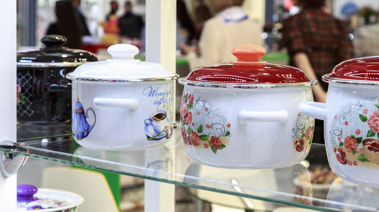 Assorted vintage cookware on store shelf