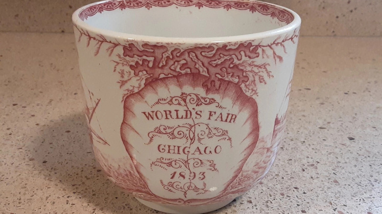 World's Fair Chicago 1893 souvenir mug on a counter