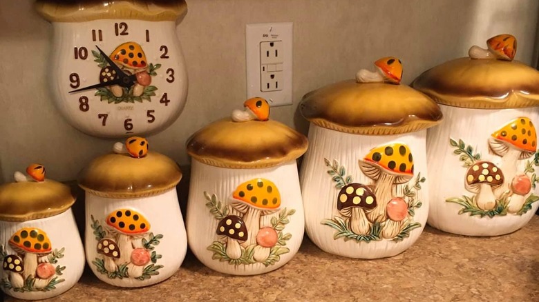 Merry Mushrooms canister set in various sizes and a Merry Mushrooms clock