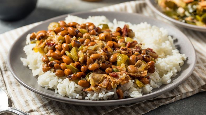 Plate of Hoppin' John, a bean and vegetable dish, served over white rice