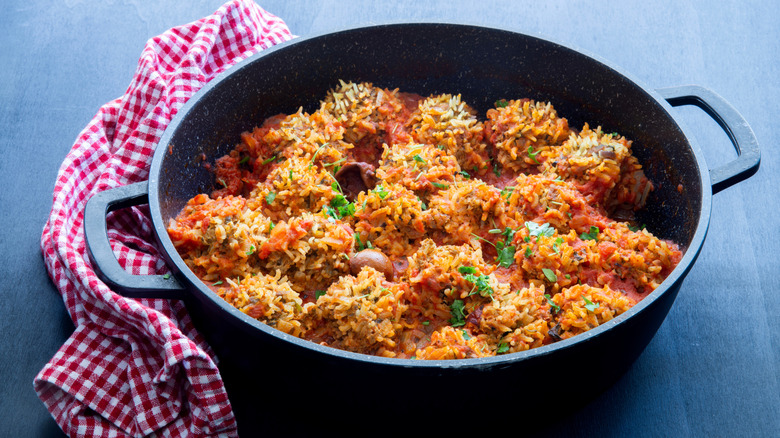 Beef and rice "porcupine" meatballs in dutch oven