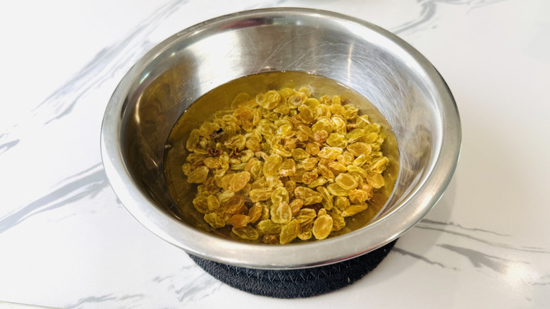 Soaking raisins in boiling water