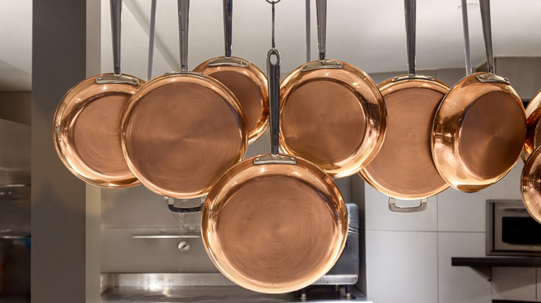 hanging copper pots and pans