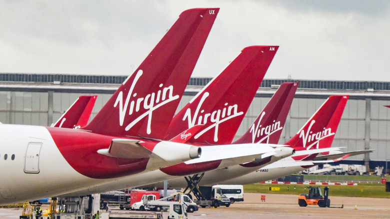 A fleet of Virgin Atlantic airplanes.