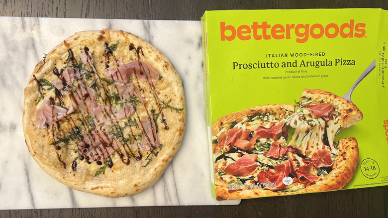 Bettergoods Italian Wood-Fired Prosciutto and Arugula Pizza on a serving platter.