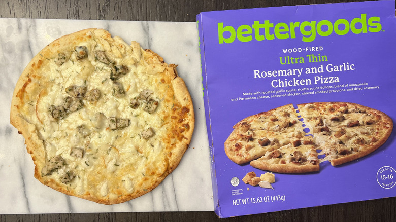 Bettergoods Wood-Fired Ultra Thin Rosemary and Garlic Chicken Pizza on a serving platter.