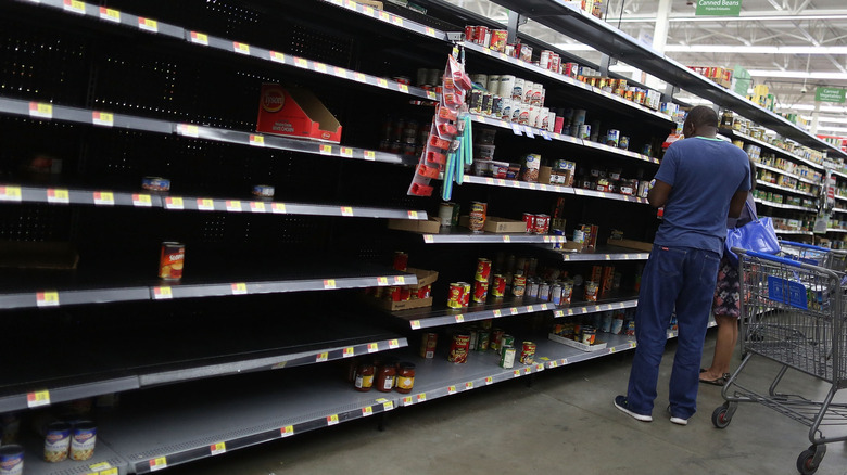 Walmart shelves that are almost completely empty