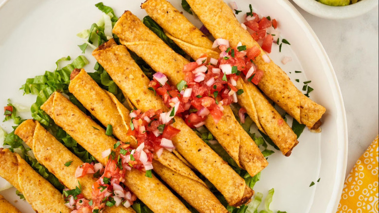 Beef taquitos with salsa