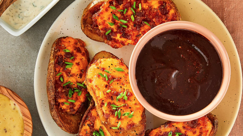 Loaded potato skins with sauce