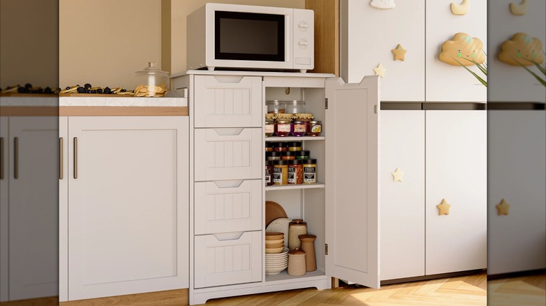 Lofka Wooden Kitchen and Pantry Storage Cabinet with an open door and a microwave on top