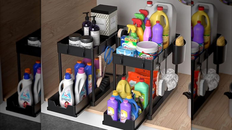Phancir Sliding Under Sink Organizer with a variety of cleaning supplies
