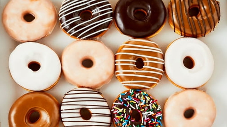 An open box of Walmart Freshness Guaranteed Assorted Ring Donuts