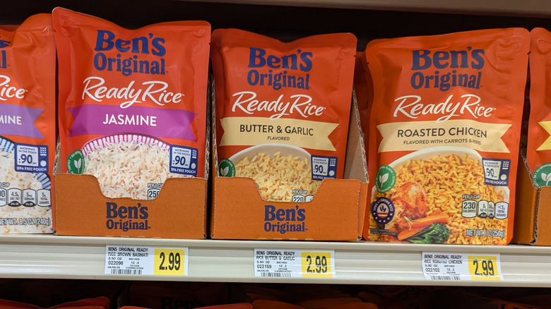 Ben's Original rice on shelf in a grocery store with price tags.