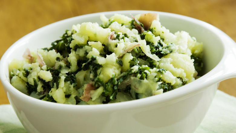 mashed potatoes with leafy vegetables